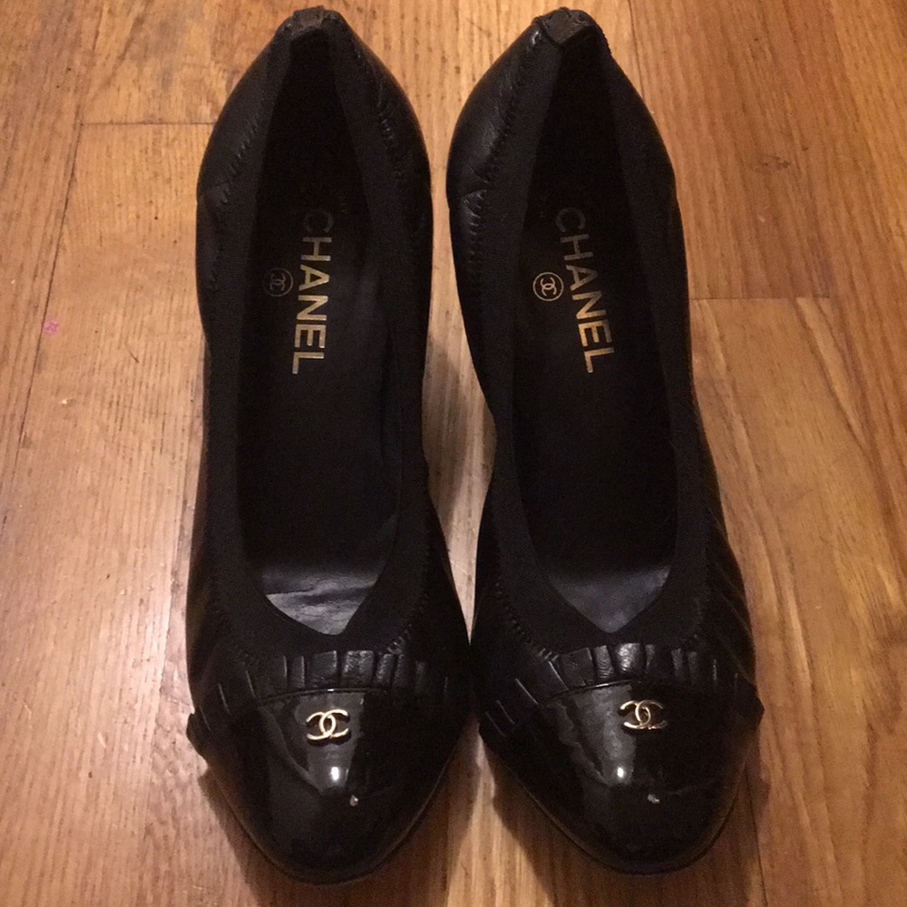 Black Chanel leather and patent leather pumps